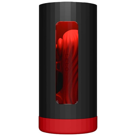 Console Lelo F1s V3 XL rouge, manchon rouge visible par la fenêtre latérale